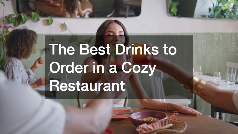 women raising glasses for a toast in a cozy restaurant